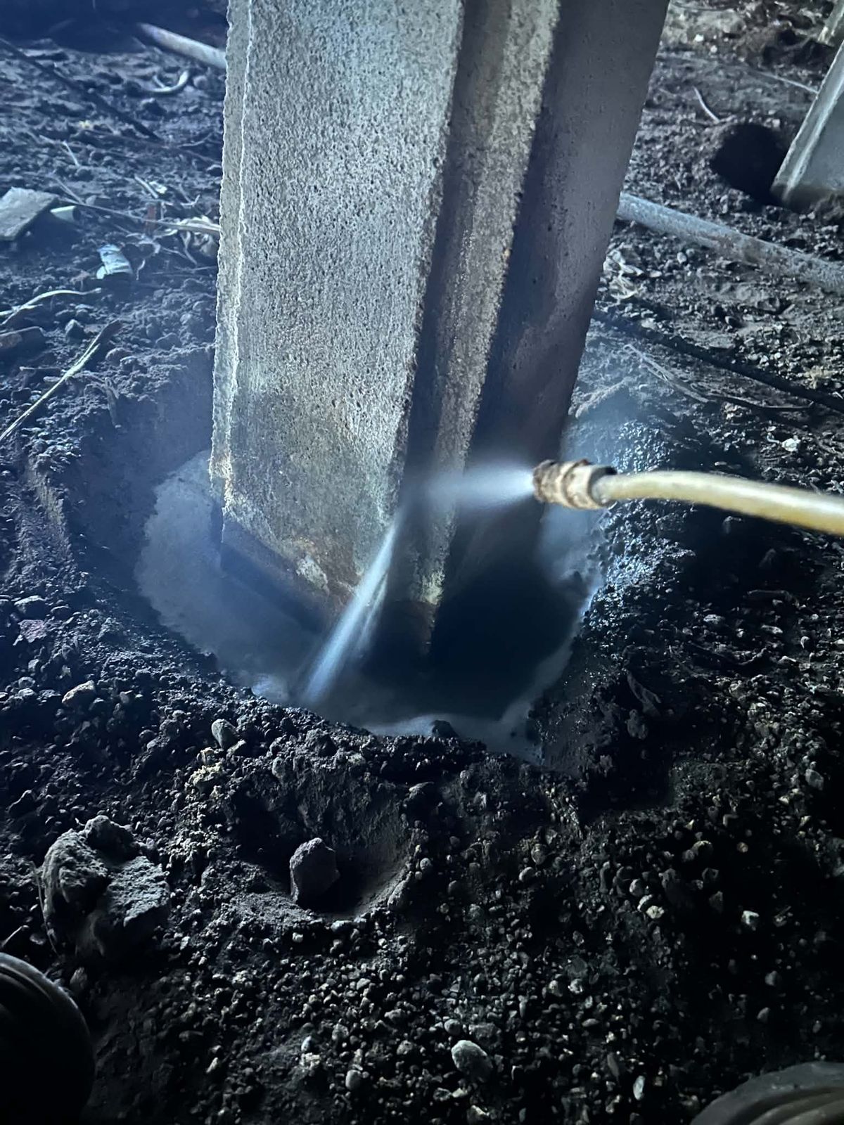Termiticide applied around subfloor piers